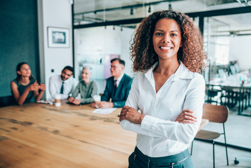 Professional woman standing in conference room